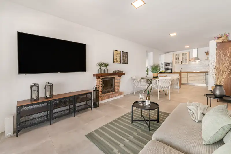 Living and dining area with fireplace